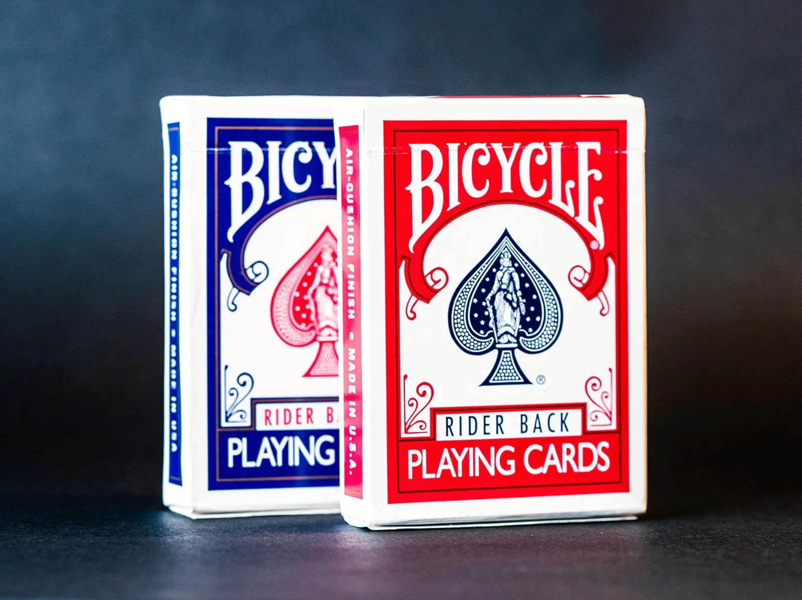 Two Bicycle Rider Back decks, ready to perform the invisible deck.